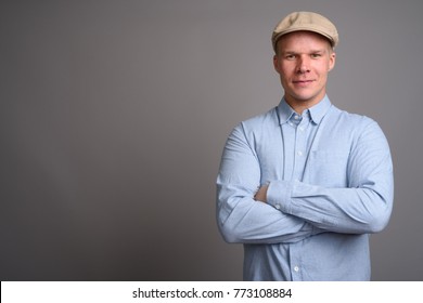 Studio Shot Of Finnish Man Against Gray Background