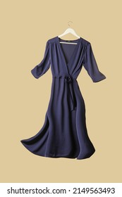 Studio shot of floating blue wrap dress - Shutterstock ID 2149563493