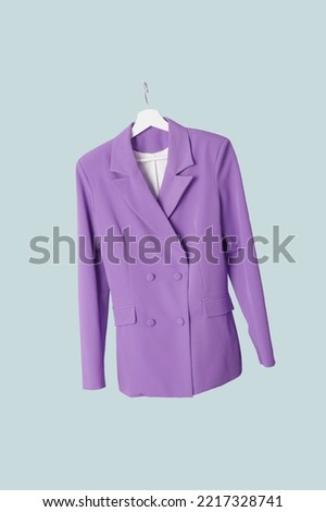 Studio shot of floating double breasted blazer on coat hanger