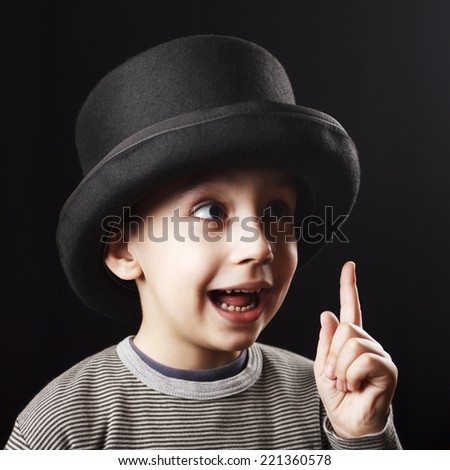 Similar – funny child with clown nose on blue background