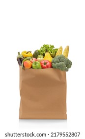 Studio shot of fresh fruits and vegetables in a paper bag isolated on white background - Shutterstock ID 2179552807