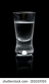 Studio Shot Of Glass Of Vodka Isolated On Black Background