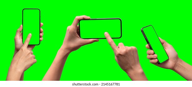 Studio shot of hand shows mobile smartphone with green screen in vertical position isolated on background. Mock up mobile for Infographic Global Business web site design app, - Clipping Path	
