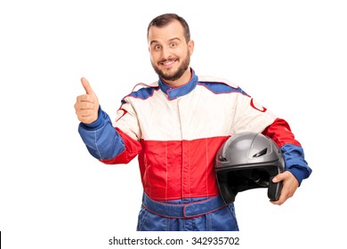 Studio Shot Of A Joyful Car Racer In A Racing Uniform Holding A Helmet And Giving A Thumb Up Isolated On White Background