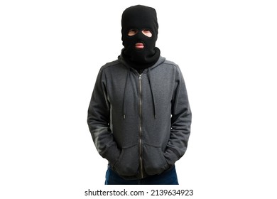 Studio shot of a masked unrecognizable young man wearing a black balaclava  - Powered by Shutterstock