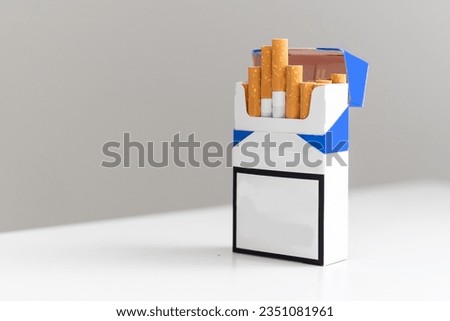 Studio shot of an opened pack of cigarettes