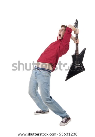 studio shot pictures on isolated background of a angry man holding a guitar and trying to break it Foto stock © 