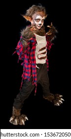 studio shot portrait of young boy in costume dressed as a Halloween, cosplay of scary werewolf pose on isolated black background