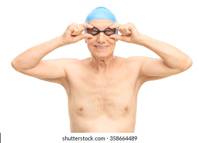 Studio Shot Of A Senior Man With A Blue Swim Cap And Black Swimming Goggles Isolated On White Background