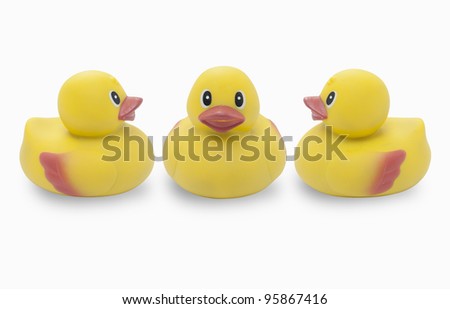 Studio shot of three yellow rubber ducks