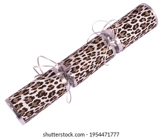 Studio Shot Of A Traditional Christmas Cracker With A Snow Leopard Print.