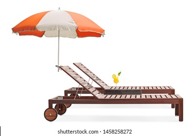 Studio Shot Of A Two Brown Sunbeds With Umbrella And A Table With A Cocktail Isolated On White Background