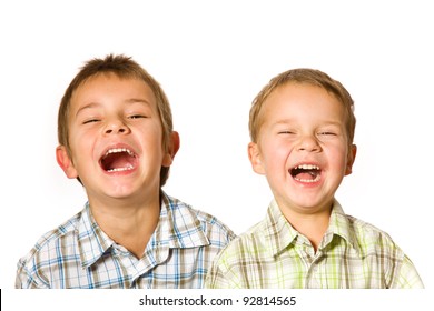 Studio Shot Of Two Laughing Boys