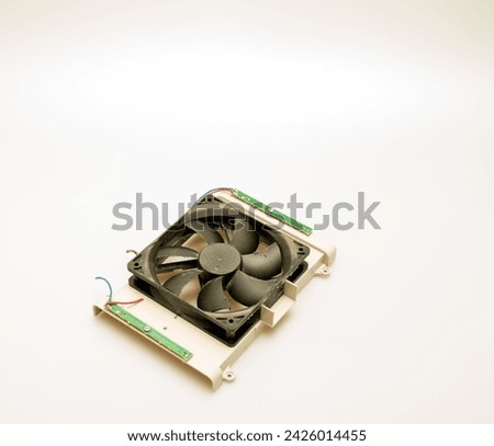 Studio shot of well used grimy and dirty electronic components isolated against a white background 