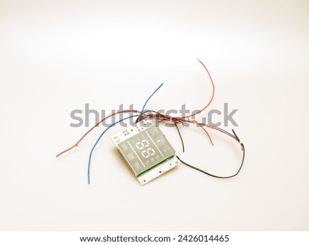 Studio shot of well used grimy and dirty electronic components isolated against a white background 