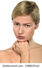 Studio Shot Of Woman With Furrowed Brow