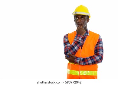 Studio Shot Of Young Black African Man Construction Worker Thinking While Looking Up