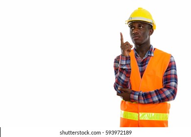 Studio Shot Of Young Black African Man Construction Worker Thinking While Pointing Finger Up