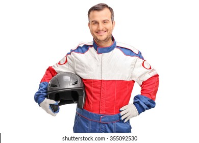 Studio Shot Of A Young Car Racer Holding A Gray Helmet And Looking At The Camera Isolated On White Background