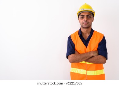 Studio Shot Of Young Indian Man Construction Worker Against White Background