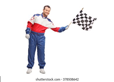 Studio Shot Of A Young Male Car Racer Waving A Checkered Race Flag Isolated On White Background