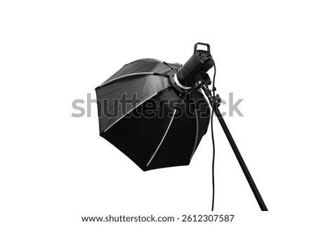 Studio softbox light isolated on white background, Photography lighting equipment with a softbox modifier on a stand.