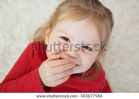 Studio style photo of young girl giggling and showing emotion Stock foto © 