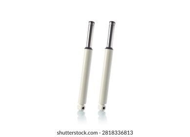 Studio three quarter perspective view of pair white front fork shock absorbers featuring polished chrome inner tubes, painted outer legs, and mounting eyelets, shot on reflective white background showcasing scooter suspension unit hardware.