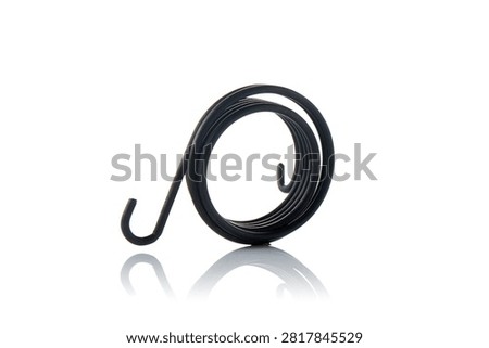 Studio three quarter perspective view of heavy duty black coated steel kickstarter return torsion spring featuring coiled wire loops, double hook anchoring ends, shot on reflective white background showcasing scooter engine starter mechanism hardware.
