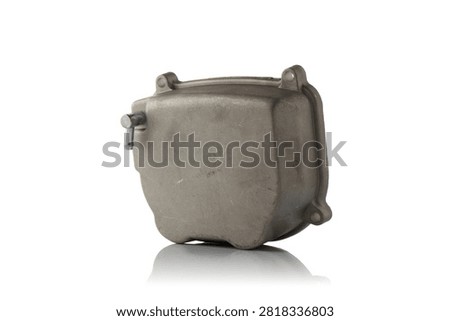 Studio three quarter perspective view of cast aluminum engine valve cylinder head cover featuring matte metallic texture, integrated crankcase breather tube fitting, and mounting bolt holes, shot on reflective white background showcasing scooter motor rebuild component.