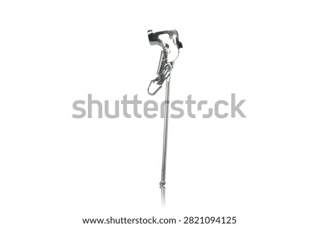 Studio three quarter perspective view of chrome metallic bicycle kickstand featuring tension spring mechanism, axle mounting bracket, durable steel construction, and subtle bottom reflection on isolated white background showcasing cycling parking hardware.