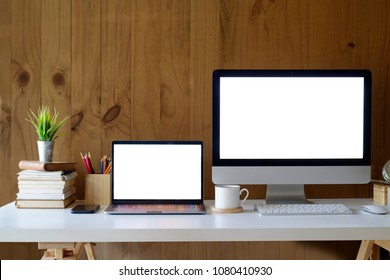 Studio workplace with blank screen desktop computer and supplies. mock up blank screen computer on table. - Shutterstock ID 1080410930