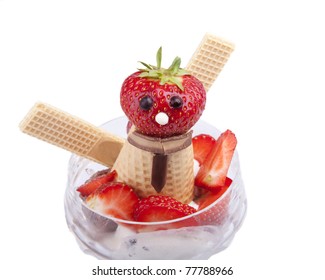 Studio-shot Of A Ice Cream Bowl With Stracciatella And Vanilla Ice Cream Topped With Chocolate Balls And Strawberries, Isolated On White. Homemade Ice Cream For Kids.