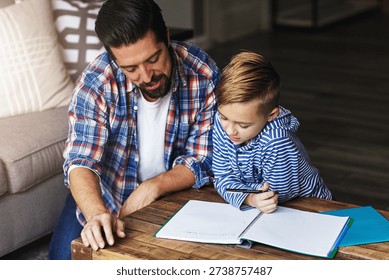 Study, child and dad with homework help in home for literacy support, test preparation and advice. Education, father and kid with book at table for language activity, writing development and guidance