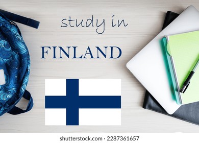 Study in Finland. Background with notepad, laptop and backpack. Education concept.