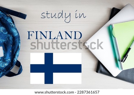 Study in Finland. Background with notepad, laptop and backpack. Education concept.