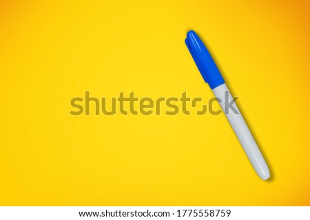 Study permanent marker on a colored background