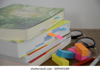 Study, reference books, workbooks, libraries, glasses - Shutterstock ID 2099492389