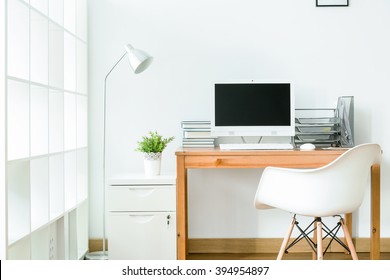 Study room in white with modern, simple furniture - Shutterstock ID 394954897