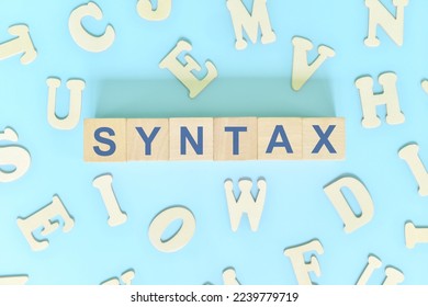Study syntax in linguistics concept. Wooden blocks word typography flat lay in blue background.