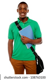 Its Study Time. Young African Student Carrying Laptop Bag And Notebook