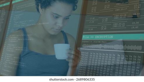 Studying software developer holding white coffee mug and debugging encryption code on desk monitor. Technology, programming, cybersecurity, coding, workspace, concentration, modern