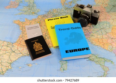 Studying the travel map, the travel guide and preparation of needed documents, Maps and necessary books and dictionaries for a vacation travel trough Europe.