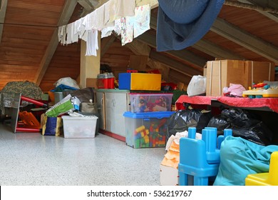 lot of stuff and clothes hanging in the attic of a nursery school