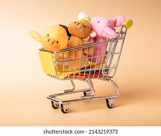 Stuffed Animals, Plush Toys In Supermarket Trolley. Buying Gifts, Presents For Children. High Quality Photo