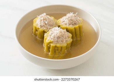 Stuffed bitter gourd with seasoned minced pork and vermicelli soup bowl