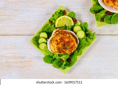 Stuffed Clam With Crabmeat And Bread Crumbs With Fresh Salad And Lemon. Seafood Concept.