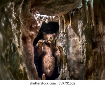 A Stuffed European Brown Bear Depicted In A Cave.