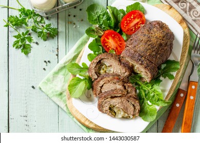 Stuffed Meat Roll With Pear And Cheese On A Festive Thanksgiving Day Table. Flat Lay. Top View. Copy Space.