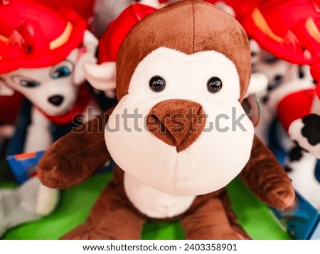 A stuffed monkey's face, with the background blurred